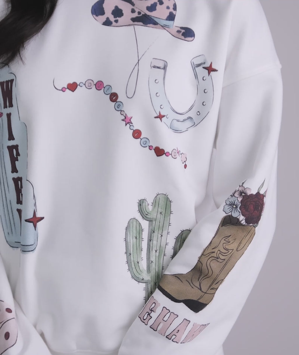 Bride wearing rodeo sweatshirt – Nashville bachelorette outfit